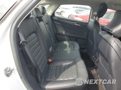 Zdjęcie 10 z 13 samochodu: 2018 FORD FUSION SE HYBRID VIN:3FA6P0LU8JR172059 - miniatura