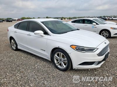 Czwarte zdjęcie samochodu z boku: 2018 FORD FUSION SE HYBRID VIN:3FA6P0LU2JR163549 - miniatura
