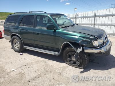 Czwarte zdjęcie samochodu z boku: 1999 TOYOTA 4RUNNER SR5 VIN:JT3HN86R5X0232732 - miniatura