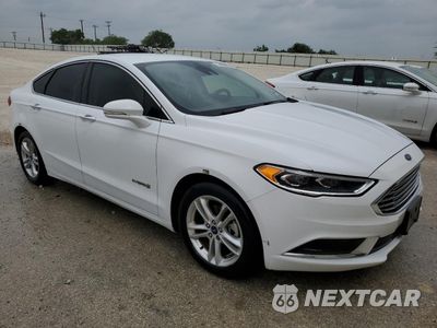 Czwarte zdjęcie samochodu z boku: 2018 FORD FUSION SE HYBRID VIN:3FA6P0LU0JR171813 - miniatura