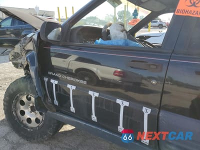 Zdjęcie 7 z 13 samochodu: 1997 JEEP GRAND CHEROKEE LAREDO VIN:1J4GZ58S1VC707714 - miniatura