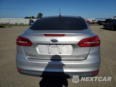 Zdjęcie 6 z 14 samochodu: 2017 FORD FOCUS SEL VIN:1FADP3H28HL223231 - miniatura