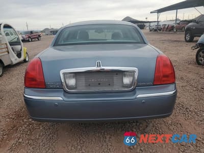 Zdjęcie 6 z 12 samochodu: 2004 LINCOLN TOWN CAR ULTIMATE VIN:1LNHM83W74Y648282 - miniatura