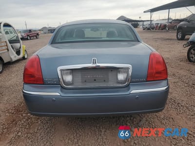 Zdjęcie 6 z 12 samochodu: 2004 LINCOLN TOWN CAR ULTIMATE VIN:1LNHM83W74Y648282 - miniatura