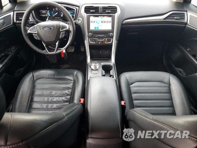 Zdjęcie 8 z 13 samochodu: 2017 FORD FUSION SE HYBRID VIN:3FA6P0LUXHR409046 - miniatura