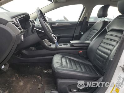 Zdjęcie 7 z 13 samochodu: 2018 FORD FUSION SE HYBRID VIN:3FA6P0LU2JR129854 - miniatura