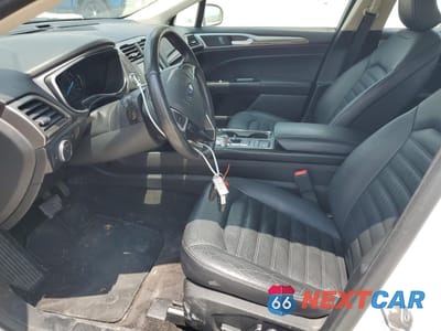 Zdjęcie 7 z 13 samochodu: 2018 FORD FUSION SE HYBRID VIN:3FA6P0LUXJR171575 - miniatura