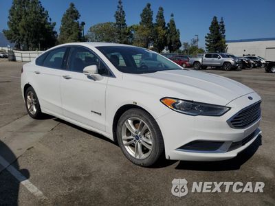 Czwarte zdjęcie samochodu z boku: 2018 FORD FUSION SE HYBRID VIN:3FA6P0LU3JR278645 - miniatura