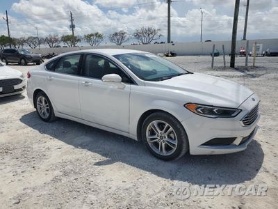 Czwarte zdjęcie samochodu z boku: 2018 FORD FUSION SE HYBRID VIN:3FA6P0LU7JR278745 - miniatura