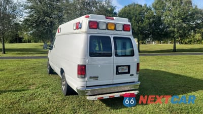 Trzecie zdjęcie samochodu z tyłu: 2013 FORD ECONOLINE E350 SUPER DUTY VAN VIN:1FDSS3EL0DDA69174 - miniatura