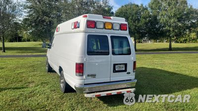 Trzecie zdjęcie samochodu z tyłu: 2013 FORD ECONOLINE E350 SUPER DUTY VAN VIN:1FDSS3EL0DDA69174 - miniatura