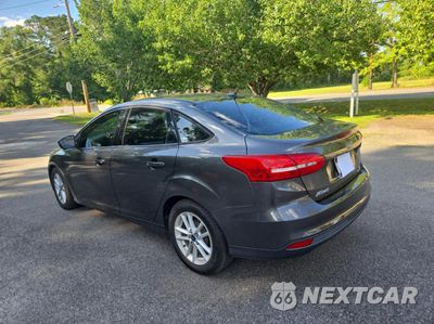 Trzecie zdjęcie samochodu z tyłu: 2015 FORD FOCUS SE VIN:1FADP3F26FL345599 - miniatura
