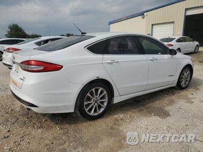 Trzecie zdjęcie samochodu z tyłu: 2017 FORD FUSION SE HYBRID VIN:3FA6P0LU1HR409551 - miniatura