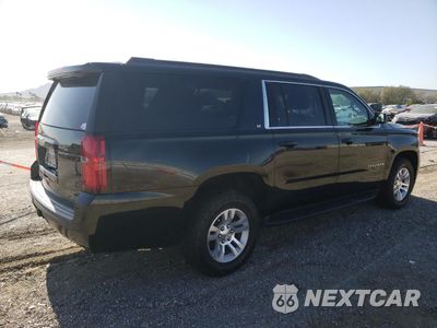 Trzecie zdjęcie samochodu z tyłu: 2019 CHEVROLET SUBURBAN C1500 LT VIN:1GNSCHKC8KR139319 - miniatura