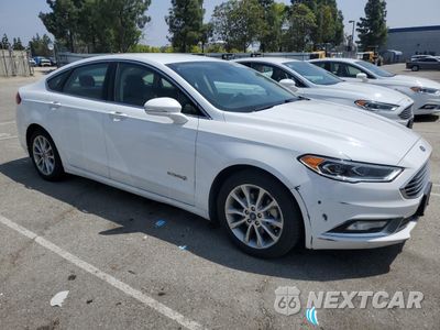 Czwarte zdjęcie samochodu z boku: 2017 FORD FUSION SE HYBRID VIN:3FA6P0LU7HR409764 - miniatura