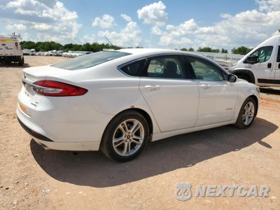 Trzecie zdjęcie samochodu z tyłu: 2018 FORD FUSION SE HYBRID VIN:3FA6P0LU5JR129850 - miniatura