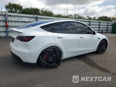 Trzecie zdjęcie samochodu z tyłu: 2023 TESLA MODEL Y VIN:7SAYGDEF8PF665049 - miniatura