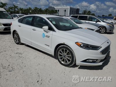 Czwarte zdjęcie samochodu z boku: 2017 FORD FUSION SE HYBRID VIN:3FA6P0LU6HR409416 - miniatura