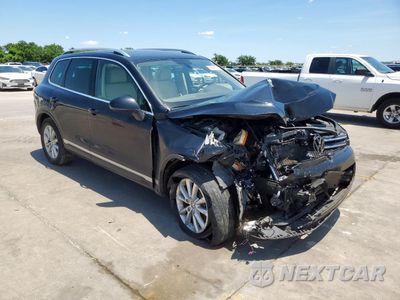 Czwarte zdjęcie samochodu z boku: 2014 VOLKSWAGEN TOUAREG V6 VIN:WVGEF9BP3ED012609 - miniatura