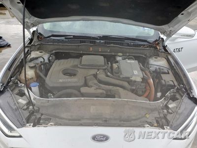 Zdjęcie 11 z 12 samochodu: 2018 FORD FUSION SE HYBRID VIN:3FA6P0LU5JR171662 - miniatura