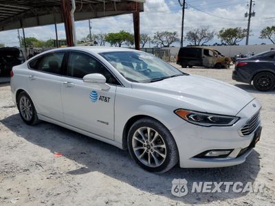 Czwarte zdjęcie samochodu z boku: 2017 FORD FUSION SE HYBRID VIN:3FA6P0LU1HR359573 - miniatura
