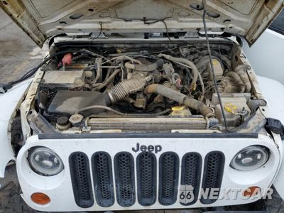 Zdjęcie 12 z 14 samochodu: 2011 JEEP WRANGLER UNLIMITED SAHARA VIN:1J4BA5H14BL634939 - miniatura