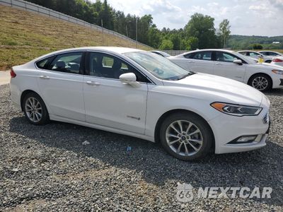 Czwarte zdjęcie samochodu z boku: 2017 FORD FUSION SE HYBRID VIN:3FA6P0LU3HR359672 - miniatura