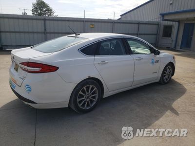 Trzecie zdjęcie samochodu z tyłu: 2017 FORD FUSION SE HYBRID VIN:3FA6P0LU3HR409535 - miniatura