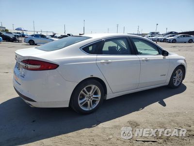 Trzecie zdjęcie samochodu z tyłu: 2018 FORD FUSION SE HYBRID VIN:3FA6P0LU4JR172141 - miniatura