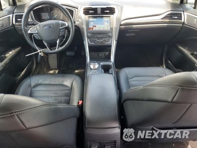 Zdjęcie 8 z 12 samochodu: 2017 FORD FUSION SE HYBRID VIN:3FA6P0LU8HR409305 - miniatura