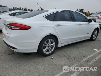 Trzecie zdjęcie samochodu z tyłu: 2018 FORD FUSION SE HYBRID VIN:3FA6P0LU4JR278623 - miniatura