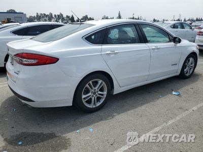 Trzecie zdjęcie samochodu z tyłu: 2018 FORD FUSION SE HYBRID VIN:3FA6P0LU3JR172146 - miniatura