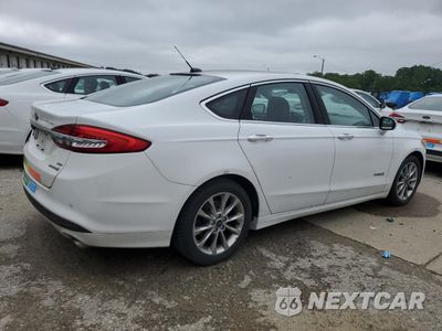Trzecie zdjęcie samochodu z tyłu: 2017 FORD FUSION SE HYBRID VIN:3FA6P0LU2HR400745 - miniatura