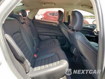 Zdjęcie 10 z 13 samochodu: 2018 FORD FUSION SE HYBRID VIN:3FA6P0LU2JR118658 - miniatura
