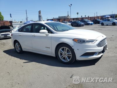 Czwarte zdjęcie samochodu z boku: 2018 FORD FUSION SE HYBRID VIN:3FA6P0LU0JR172136 - miniatura