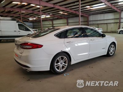 Trzecie zdjęcie samochodu z tyłu: 2018 FORD FUSION SE HYBRID VIN:3FA6P0LU5JR278680 - miniatura