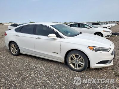 Czwarte zdjęcie samochodu z boku: 2018 FORD FUSION SE HYBRID VIN:3FA6P0LU2JR163552 - miniatura