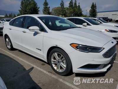 Czwarte zdjęcie samochodu z boku: 2018 FORD FUSION SE HYBRID VIN:3FA6P0LU7JR278633 - miniatura