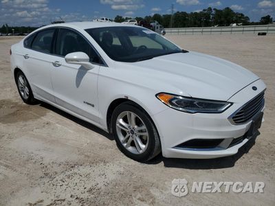 Czwarte zdjęcie samochodu z boku: 2018 FORD FUSION SE HYBRID VIN:3FA6P0LU9JR178484 - miniatura