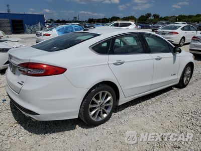 Trzecie zdjęcie samochodu z tyłu: 2017 FORD FUSION SE HYBRID VIN:3FA6P0LU0HR359693 - miniatura