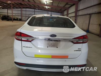 Zdjęcie 6 z 12 samochodu: 2018 FORD FUSION SE HYBRID VIN:3FA6P0LUXJR163489 - miniatura