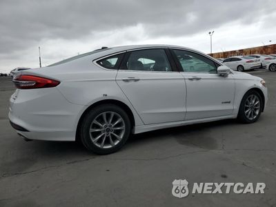 Trzecie zdjęcie samochodu z tyłu: 2017 FORD FUSION SE HYBRID VIN:3FA6P0LU7HR409344 - miniatura