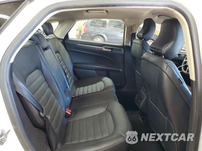 Zdjęcie 10 z 12 samochodu: 2018 FORD FUSION SE HYBRID VIN:3FA6P0LU8JR172000 - miniatura