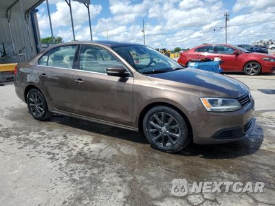 Czwarte zdjęcie samochodu z boku: 2014 VOLKSWAGEN JETTA SE VIN:3VWD07AJ7EM223672 - miniatura