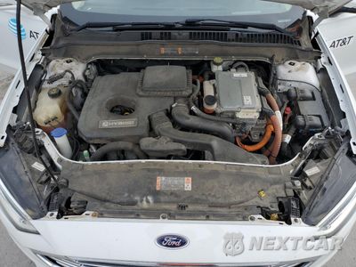 Zdjęcie 11 z 12 samochodu: 2018 FORD FUSION SE HYBRID VIN:3FA6P0LU0JR118691 - miniatura