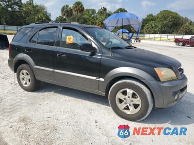 Czwarte zdjęcie samochodu z boku: 2006 KIA SORENTO EX VIN:KNDJD733765593679 - miniatura