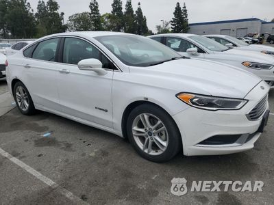 Czwarte zdjęcie samochodu z boku: 2018 FORD FUSION SE HYBRID VIN:3FA6P0LU4JR172124 - miniatura