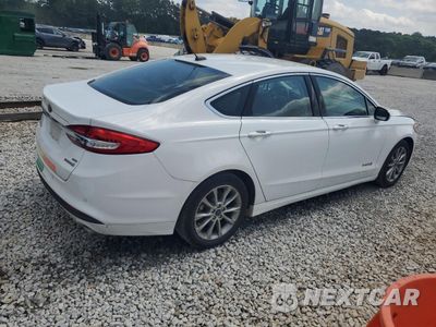 Trzecie zdjęcie samochodu z tyłu: 2017 FORD FUSION SE HYBRID VIN:3FA6P0LUXHR409614 - miniatura