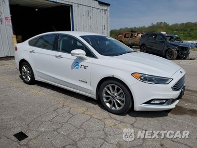 Czwarte zdjęcie samochodu z boku: 2017 FORD FUSION SE HYBRID VIN:3FA6P0LU9HR400712 - miniatura
