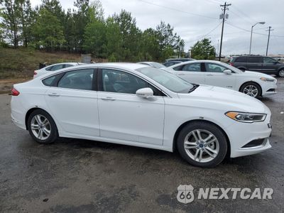 Czwarte zdjęcie samochodu z boku: 2018 FORD FUSION SE HYBRID VIN:3FA6P0LU5JR171788 - miniatura